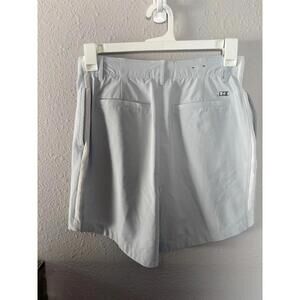 Under Armour light grey golf skort size S. Thicker, quality material. Slightly l